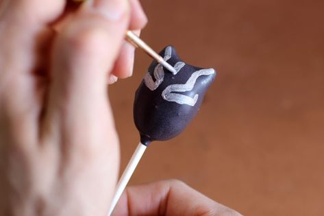 Awesome DIY Black Panther Cake Pops & Cupcakes | eHow Black Panther Treats, Black Panther Cupcakes Ideas, Black Panther Cake Pops, Black Panther Cake, Panthers Cake, Themed Cake Pops, Black Panther Movie, Pop Cupcakes, 5 Birthday