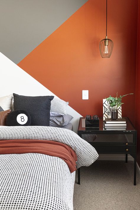 Bedroom - Grayson 30 - Brighton Homes Orange Walls Bedroom Ideas, Orange Wall Paint Ideas Bedroom, Orange Feature Wall Bedroom, Orange Painted Bedroom, Boys Orange Bedroom Ideas, Orange Feature Wall Living Room, Orange Bedroom Ideas Walls, Orange Grey Bedroom, Bedroom Orange Accents