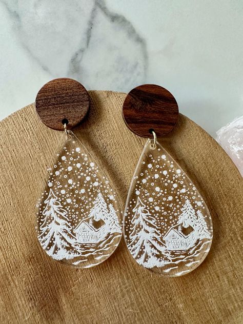 "This listing is for one pair of acrylic and wood earrings. They measure about 2.5\" in length, and are the perfect pair of winter statement earrings. The posts are surgical steel, and they are hypoallergenic." Wood Dangle Earrings, Engraving Ideas, Laser Cut Wood Earrings, Snowy Scene, Laser Cut Wood Crafts, Winter Earrings, Quirky Earrings, Earrings Acrylic, Steel Gifts