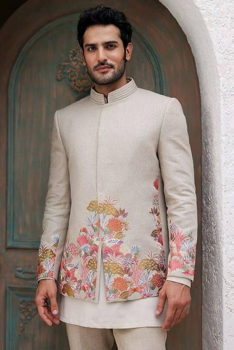 Check out these stunning and fresh tropical-themed outfits for grooms, from pastel bandhgalas to unique floral kurtas. Perfect for your exotic wedding! Beige Bandhgala, Indo Western Men, Groom Indian Wedding Outfits, Indian Wedding Clothes For Men, Wedding Kurta, Wedding Kurta For Men, Engagement Look, Haldi Outfits, Groom Dress Men