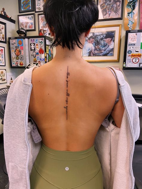 Spine Tattoos For Women Lyrics, Feminist Spine Tattoo, The Sun Will Rise Again Tattoo Spine, Medium Spine Tattoos For Women, The Sun Will Rise Tomorrow Tattoo, Bible Quote Spine Tattoo, Perfectly Imperfect Tattoo Spine, Still I Rise Spine Tattoo, Hebrew Spine Tattoos For Women