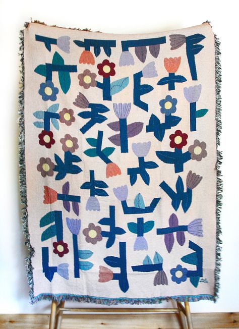 "This is a woven blanket featuring Leah's \"flower tetris\" design. This blanket is a large 54\" x 72\" tapestry. It is 100% cotton with most of the cotton being recycled. Featuring flowers in blue, yellow, green, coral, burgundy, lavender, and brown on a beige background. This can be used as a throw blanket or hung up as a tapestry.  Made in North Carolina, USA. Each blanket will be shipped with an info card and tissue paper in a secure box. Hand wash in cool water using mild detergent or machi Tetris Blanket, Tetris Design, Blanket Tapestry, Beige Background, Woven Blanket, Star Flower, Textile Art, Linen Bedding, Fiber Art