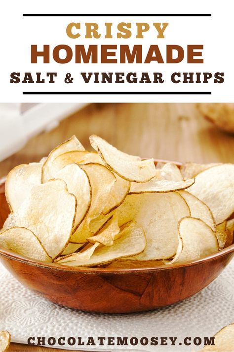 Crispy Homemade Salt & Vinegar Chips from scratch taste just like store-bought chips with their lip-smacking flavor thanks to one secret ingredient. Learn how to make baked salt and vinegar chips as well as frying them. Once they’re done cooking, let your chips cool in a single layer for a few minutes. If you pile them on top of each other, they may get soggy from the heat. How To Make Salt And Vinegar Chips, Salt Vinegar Chips, Salt And Vinegar Chips Air Fryer, Homemade Kettle Chips, Homemade Chips In Oven, Salt And Vinegar Chips Recipe, Homemade Salt And Vinegar Chips, Oven Potato Chips, Diy Chips