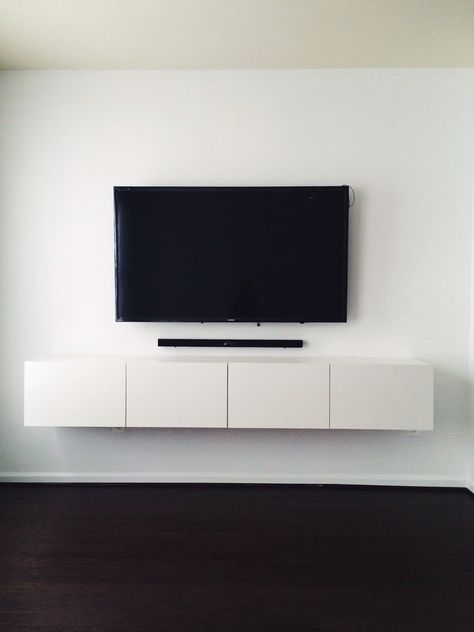 IKEA BESTÅ media console. Mounted tv with hidden wires. Now that's clean. Ikea Entertainment Center, Floating Wall Unit, Tv Couch, Console Ideas, Tv Wall Shelves, Console Wall, Wall Mount Tv Stand, Tv Mounted, Mount Tv