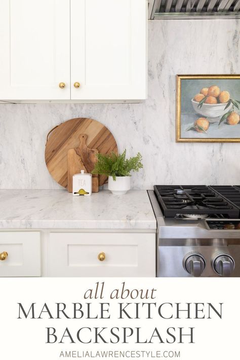 My favorite element of our kitchen design is our marble backsplash. It flows so seamlessly with our countertop and the overall design is just lovely. White Kitchen Cabinets Marble Backsplash, Marble Backsplash And Countertop, Marble Countertop And Backsplash Kitchen, Marble Kitchen Countertops And Backsplash, Kitchen Countertop As Backsplash, White Kitchen With Marble Backsplash, Laminate Countertops And Backsplash, Carrara Marble Backsplash Kitchen, Solid Marble Backsplash Kitchen