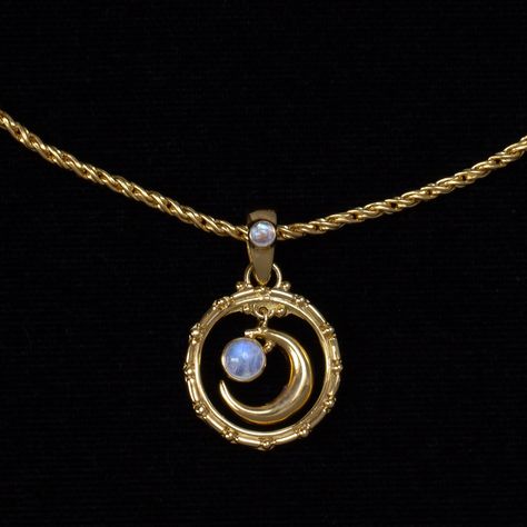 This Rainbow Moonstone gold moon necklace, handcrafted in 18K Gold Vermeil is designed in a Balinese style, adding a touch of exotic allure. The celestial necklace features a Moonstone crescent moon elegantly dangling in a Balinese-style hoop, accented by a smaller moonstone on the bail.  While the moon symbolizes feminine energy, emotions, and feelings, Rainbow Moonstones have been used in ancient rituals for their powerful healing properties. They are known to strengthen your intuition, provid Crescent Moon Necklace Aesthetic, Celestial Jewelry Aesthetic, Moon Ritual Aesthetic, Moon Jewelry Aesthetic, Moon Necklace Aesthetic, Ancient Rituals, Balinese Style, Rainbow Moonstone Jewelry, Gold Moon Necklace