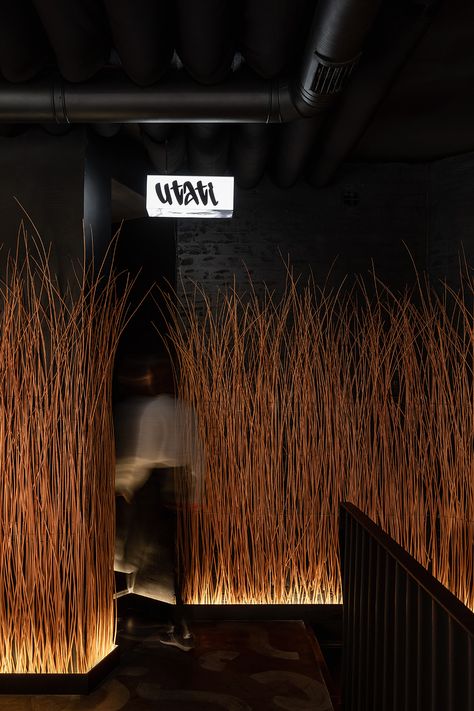 Asian Interior Design Restaurant, Asian Bistro Interior, Black Restaurant Interior Design, Asian Fusion Restaurant Design, Bamboo Restaurant Interior Design, Rustic Restaurant Interior Design Ideas, Tree In Restaurant, Moody Restaurant Interior, Dark Restaurant Interior