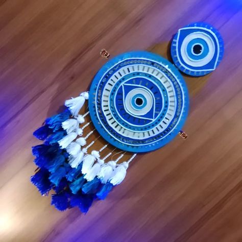 Handmade evil eye 🧿 wall hanging Customized order ✅ . . #lippanart #wallhangingdecor #evileye #evilprotection #handmade #hanging #lippanartwalldecor #walldecor #wallhanging #walldecoration Evil Eye Wall Hanging Diy, Evil Eye Lippan Art Design, Evil Eye Lippan Art, Evil Eye Craft, Evil Eye Hanging, Lipan Art, Painted Mirror Art, Evil Eye Wall Hanging, Evil Eye Art