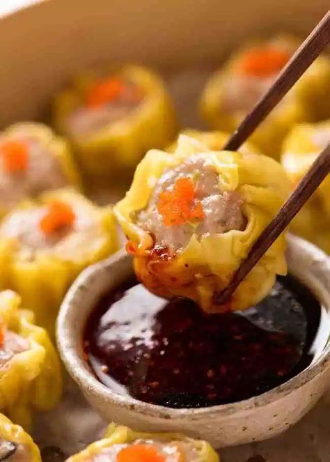 Close up of Siu Mai (Chinese steamed dumpling) dipped in sauce Siomai Recipe, Chinese Steamed Dumplings, Siu Mai, Dim Sum Recipes, Chinese Cooking Wine, Steamed Dumplings, Recipetin Eats, Recipe Tin, Chinese Cooking