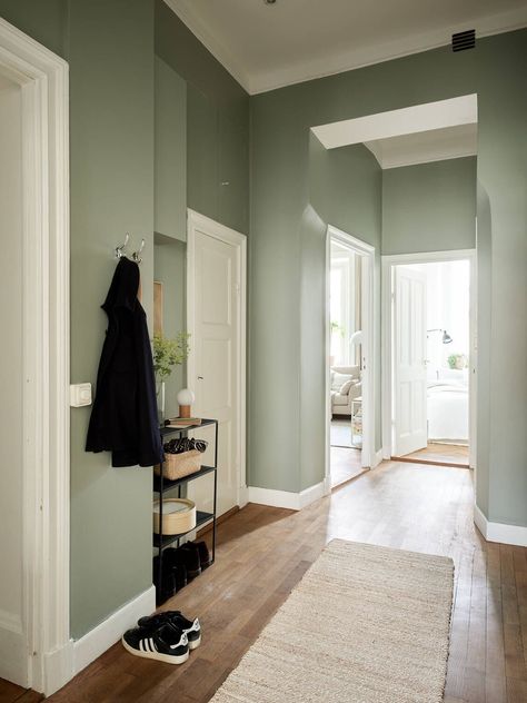 Pale Green Walls Living Room, Pale Green Hallway, Sage Green Interior Design Living Room, Light Green Hallway, Pale Green Walls, Hallway Green, Pastel Wall Color Ideas, Hallway Wall Colors, Brick Living Room