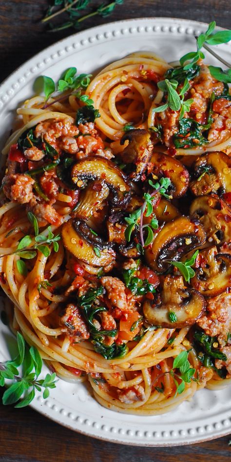 30-Minute Sausage and Mushroom Pasta with Tomato Sauce and Spinach on a plate. Pasta With Spinach Tomatoes And Mushrooms, Sausage Mushroom Pasta Recipes, Pasta With Mushrooms And Tomatoes, Mushroom Sausage Pasta, Spaghetti Meal Prep, Sausage Tomato Pasta, Sausage Mushroom Pasta, Sausage And Mushroom Pasta, Pasta With Tomato Sauce