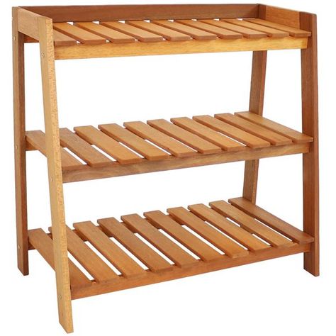 Keep your gardening tools organized, store extra planters and pots, or display your favourite herbs, flowers, greens, and budding veggies with this sturdy garden shelf plants stand. This convenient outdoor shelf is made from durable yet lightweight Meranti wood with a stylish teak oil finish and has a contemporary design that is sure to complement any outdoor decor style while remaining durable against the elements. It has three sturdy, wooden storage shelves to store a number of home items such Outdoor Shelf, Garden Shelf, Wooden Storage Shelves, Meranti Wood, Small Planters, Wood Storage Shelves, Outdoor Shelves, Support Pour Plante, Garden Shelves