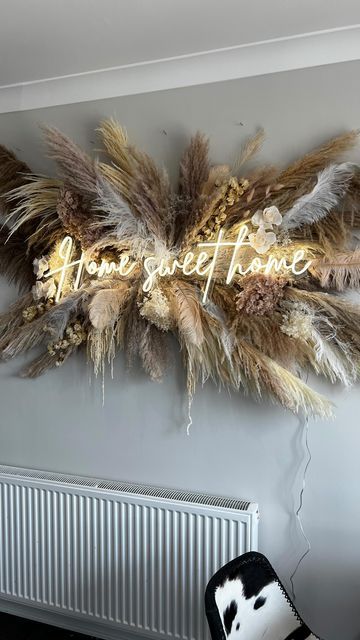 Pampas Corner Decor, Pampas Room Decor, Nude Flower Wall, Flower Wall For Salon, Pampas Grass Accent Wall, Pampas Grass Backdrop Wall, Home Flower Wall, How To Hang Pampas Grass On Wall, Pampas Grass Installation