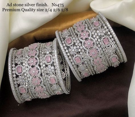 Beautiful Silver and Pink AD Bangles Buy Now WhatsApp on +91 9152348769! #silverandpinkdiamondbangles #silverandpinkdiamondbracelet #silverdiamondbangles #silverdiamondbracelet #silverdiamondbanglesdesign #silverdiamondbanglesset #adbangles Ad Bangles Design, Pakistani Bridal Dresses Online, Ad Bangles, Pink Bangles, Bangles Silver, Silver Diamond Bracelet, Jewelry Set Design, Bangles Set, Bangles Design