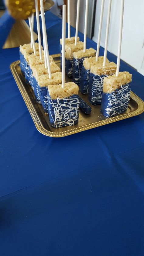 Royal Blue Rice Crispy Treats Cake Pops Royal Blue, Navy Blue Rice Krispy Treats, Blue Treat Table Ideas, Royal Blue Rice Krispie Treats, Royal Blue Treat Table, Royal Blue And Gold Treat Table, Navy Blue Candy Table, Blue And Gold Dessert Table Ideas, Royal Blue Sweets Table