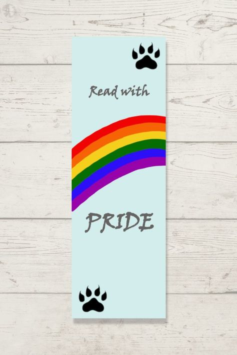 Light Blue bookmark with a rainbow reaching left to right in the center. In the upper right hand, and lower left hand corners have black paw prints. Reads "Read with" above the rainbow, and "Pride" below the rainbow. Diy Canvas Art, Diy Canvas, Lgbtqia Art, Rainbow Bookmark, Bookish Art, Canvas Painting Designs, Rainbow Art, Lovers Gift, Book Lovers Gifts