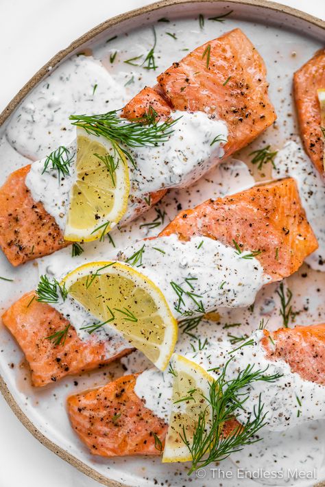 Keep things quick and very tasty with this salmon with lemon dill sauce. This simple salmon recipe is for those nights when you want something that feels elevated without all the effort. The salmon is cooked to flaky perfection, and paired with a creamy fresh dill sauce for a healthy and delicious dinner that's ready in under 30 minutes. #theendlessmeal #salmon #lemondillsauce #fish #easyrecipe #quickrecipe #healthyrecipe Lemon Dill Salmon, Dill Sauce For Salmon, Salad Appetizer Cups, Salmon With Lemon, Lemon Dill Sauce, Dill Recipes, Dill Salmon, Sauce For Salmon, Easy Salmon Recipes