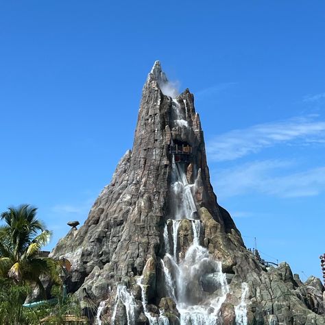 Volcano Bay Aesthetic, Tropical Volcano, Genshin Dr, Evil Lair, Volcano Bay, Summer Travel, Volcano, Palm Trees, Mount Rushmore