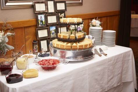 Wedding cheesecake bar with many toppings. Cheesecake Buffet Wedding, Grooms Cheesecake Table Ideas, Mini Cheesecake Bar Wedding, Cheesecake Bars Wedding, Cheesecake Bar Wedding Ideas, Cheesecake Toppings Bar Ideas, Build Your Own Cheesecake Bar, Cheesecake Bar At Wedding, Cheesecake Station Wedding