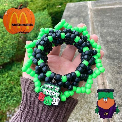 McDonald's Halloween Bucket Kandi Cuff 

- handmade... - Depop Kandi Corset, Christmas Kandi, Goth Kandi, Kidcore Nostalgia, Fall Goth, Kandi Singles, Kandi Rave, Kawaii Kidcore, Kandi Cuff Patterns