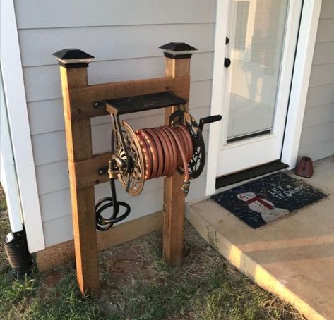 Spring Backyard, Garden Hose Storage, Garden Hose Holder, Hose Storage, Hose Holder, Front Porch Ideas Curb Appeal, Small Front Porches, Hose Reel, Outside Ideas