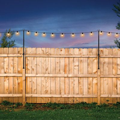 Enhance your outdoor space with the Excello Global Products 2 pack of 5.3-foot deck and fence-mounted string light poles. These versatile poles offer a customizable and elegant solution to illuminate your deck or fence, creating a captivating ambiance for any occasion. With a unique design that allows for easy assembly and height adjustment, these poles provide a hassle-free way to showcase your string lights with style. Excello Global Products | Excello Global Products 2 Pack Of 5.3' Deck / Fen Backyard Neon Sign, Dear Edwina, Yard String Lights, String Light Poles, Patio Areas, Deck Fence, Hanging String Lights, Privacy Walls, Light Pole