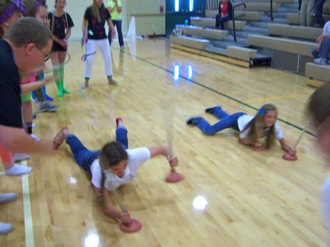 A super easy game for a rally or assembly. You just need a few plungers and have the kids lay on their stomachs and pull themselves across the floor in a race!   {Bishop Manogue High School, Reno} Fun High School Assembly Games, Assembly Games Elementary, Pepfest Games, High School Assembly Games, Pep Rally Game Ideas High Schools, Fun Pep Rally Games High Schools, High School Assembly Ideas, Rally Games High School, Pep Assembly Games High School