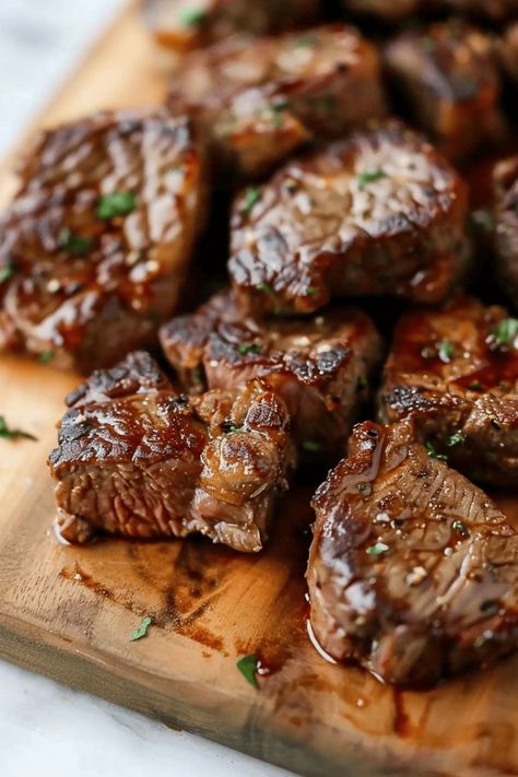 Try these air fryer steak bites for a hearty meal the family will love! The garlic butter sauce truly takes them over the top! Air Fryer Steak Bites, Salmon Bites Recipe, Garlic Butter Steak Bites, Butter Steak Bites, Spicy Steak, Frozen Steak, Steak Bites Recipe, Garlic Steak, Air Fryer Steak