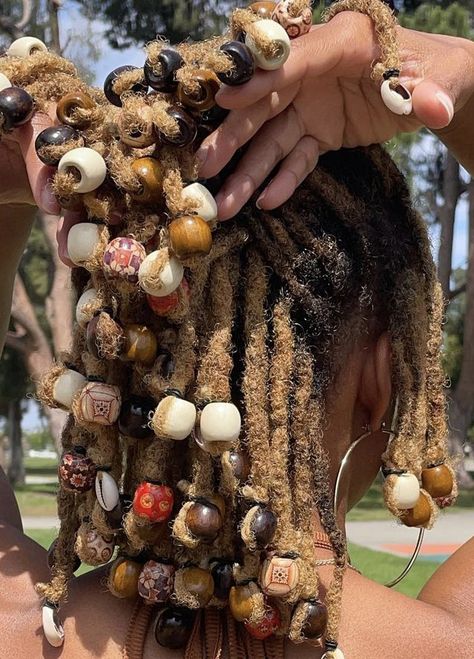 Afrocentric Loc Styles, Loc Styles Beads, Locs With Beads And Shells, Beads On Dreads Locs, Loc Bead Styles, Locs With Layers, Locs And Beads, Earthy Locs, Shoulder Length Dreadlocks