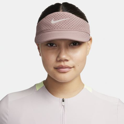 This unstructured low-depth visor is made for tennis lovers both on and off the court. Ventilation in the design provides a breezy feel where you need it most, while the stretchy, sweat-wicking fabric helps you stay fresh. The shortened AeroBill is designed for minimal distractions while you're serving so you confidently play your best. Tennis Visor, Tenis Nike, Table Tennis, Snapback Hats, Nike Dri Fit, Dri Fit, Athletic Shoes, Tennis, Nike