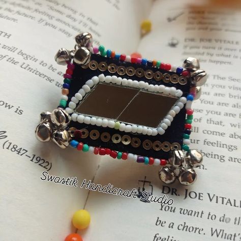 New Arrival ✨🌼... Quirky Fabric adjustable finger Ring 💍✨ detailed with adjustable silver ring..🫳🏻💍colourful beads & silver ghungaroo...🌼 And mirror.... Specially crafted by adding Navratri vibes into outfits... With trending colours... This fingure ring can be use to add boho look in your outfits...😍📿✨ Swipe left.. For more images .. Get ready to style with this quirky finger rigs in this Navratri.. Price starts from ₹100-150 .. For enquiry & customisation 👇 whats app on +91 9321155207 ... Silver Jewelry Hand Set For Navratri, Fabric Finger Ring, Navratri Rings, Festive Mirror Work Jewelry For Navratri, Navratri Ring Handmade, Navratri Belt Handmade Mirror, Diy Jewellery Designs, Jewelry Mirror, Handmade Jewelry Designs