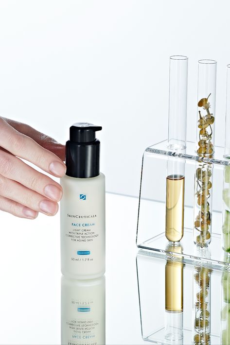 A clean shot featuring a Skin Ceuticals product shot, advertising the light face cream. The image was styled with labaratory equipment to reflect the scientific nature of the brand. | #dephotographic #SkinCeuticals #Cosmeticphotography Science Product Photography, Scientific Skincare, Skin Ceuticals, Product Shoot, Cosmetics Photography, Product Photographer, Cosmetics Skincare, Still Life Photographers, Reflective Surfaces