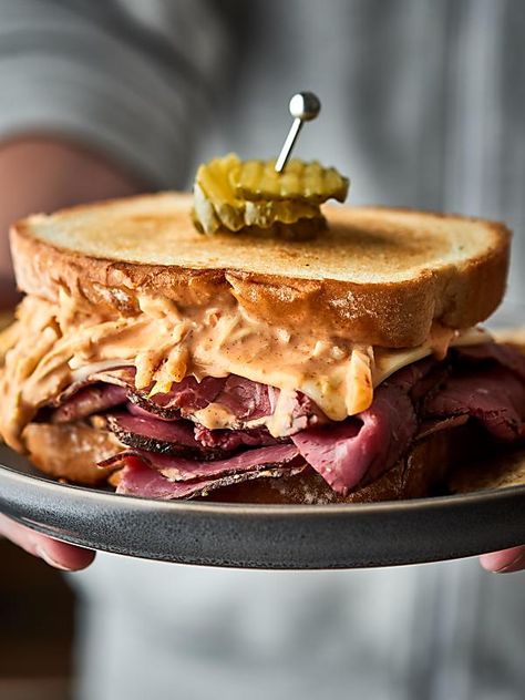 #ad A twist on a classic, this pastrami sandwich is outta this world good! Artisan-style bread loaded with thinly sliced pastrami, swiss cheese, and the BEST coleslaw made with a tangy homemade russian dressing. Can be served hot or cold! showmetheyummy.com Made in partnership w/ @SaraLeeBread #saraleebread #artesanobread Pastrami Sandwich Recipe, Homemade Russian Dressing, Pastrami Recipe, Trendy Recipes, Savory Breads, Pastrami Sandwich, Russian Dressing, Homemade Sandwich, Beef Sandwiches