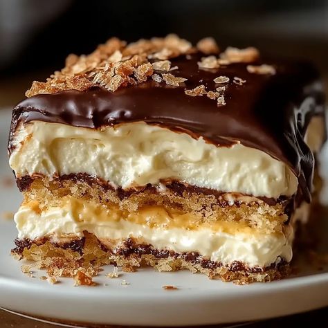 No-Bake Chocolate Eclair Cake Individual Eclair Cakes, Eclair Cake No Bake, Moist Pineapple Cake Recipe, No Bake Chocolate Eclair, Chocolate Eclair Dessert, Rich Chocolate Dessert, No Bake Eclair Cake, Eclairs Dessert, 3 Ingredient Cakes