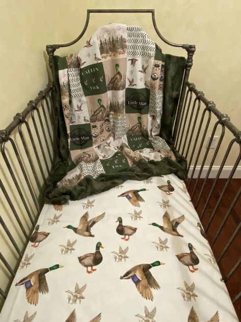 Whole cloth patchwork print blanket in a duck hunting woodland theme print. (fabric is printed to look like a patchwork blanket) Blanket measures approximately 42" x 50" Back of blanket and front border is super soft minky fabric. Fitted cotton crib sheet fits standard size crib mattresses 28" x 52" This item is made to order. Please allow 3 - 4 weeks production time. Don't see exactly what you are looking for? Contact us with any questions. Since our bedding is made to order we can make changes and customize the pieces just for you. Little Hunter Nursery, Ducks Nursery Theme, Boy Nursery Hunting Theme, Hunting Theme Baby Shower, Duck Hunting Themed Nursery, Boy Baby Room Ideas, Baby Nursery Theme Ideas, Hunting Nursery Theme, Duck Nursery Theme