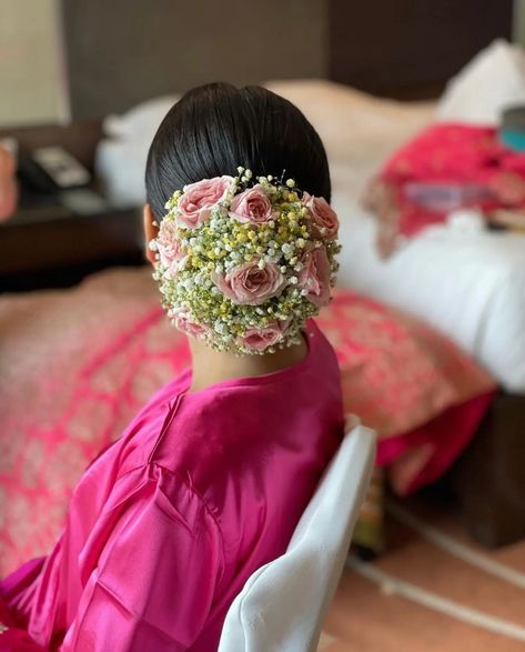 #Trending: 20+ Designs Of Unique Dual Floral Buns For Brides! - ShaadiWish Real Flower Bun Hairstyle, Floral Bun Hairstyle Indian, Flower Bun For Bride, Real Flower Bun For Bride, Bridal Buns With Flowers, Bridal Bun Flowers, Bun Hairstyles For Bride, Flower Bun Hairstyle Wedding Bride, Real Flowers In Hair