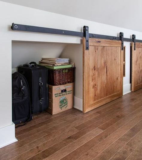 Have a small nook that you're not sure what to do with? Turn it into extra storage, hidden by a mini barn door. Learn more at The House Diaries. Rolling Doors, Attic Closet, Big Bedrooms, Attic Conversion, Attic Bathroom, Attic Space, Attic Bedrooms, Attic Renovation, Attic Storage