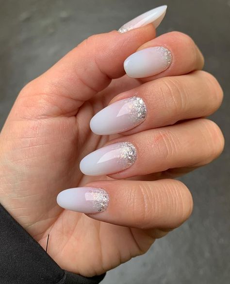 Glittering Shine White Nails With Design White Based Nail Designs, Milky White Nails With Silver Design, White Nail With Glitter, White Nails With Glitter Tips, White Nail Glitter Tip, Classic White Nails, Wedding Nails Milky White, Milky White And Silver Nails, Milky White Wedding Nails