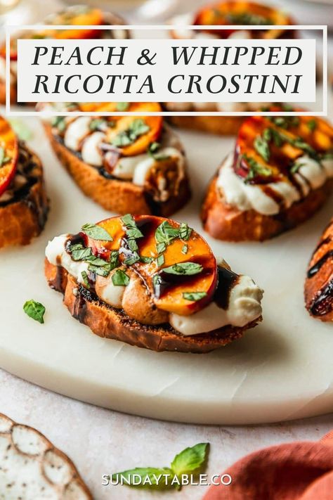 This whipped ricotta crostini is about to be your new favorite appetizer recipe! It has crispy crostini, creamy whipped ricotta cheese, juicy peaches, fresh basil, and balsamic glaze. So good! Of course, you don't have to use peaches on these appetizer bites. You can also try hot honey, pistachios, prosciutto, strawberries, roasted tomatoes, or anything else you like. These crostini are the perfect finger food for a dinner party, holidays, and everything in-between. They're a huge crowd ... Honey Ricotta Crostini, Burrata And Peaches Appetizer, Fancy Crostini Appetizers, Peach And Cheese Appetizer, Whipped Ricotta Crostini, Italian Snacks Appetizers, Elevated Appetizers, Whipped Ricotta Cheese, Crispy Crostini