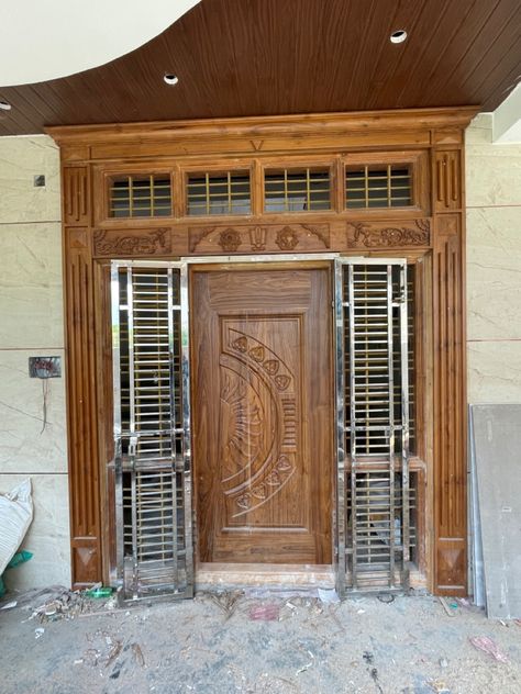 Teak wood main door #teakdoor Grill Door Design, Steel Gate, Main Door, Steel Doors, Wood Doors, Best Interior, Teak Wood, Door Design, Teak