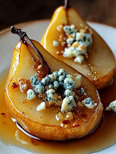 Baked Pears with Blue Cheese and Honey 🍐🧀🍯
Ingredients:
    4 ripe but firm pears, halved and cored
    1/2 cup crumbled blue cheese
    2 tablespoons honey
    1 tablespoon olive oil
    1 teaspoon fresh thyme leaves
    Salt and pepper, to taste
    Optional: Chopped walnuts for garnish

Instructions:
    Preheat the Oven:
    Set your oven to 375°F (190°C).

    Prepare the Pears:
    Halve the pears and use a melon baller or spoon to scoop out the cores, creating small wells in each half.

    Assemble the Pears:
    Arrange the pear halves in a baking dish, cut side up. Drizzle each pear with a little olive oil. Fill the hollowed centers with crumbled blue cheese.

    Bake the Pears:
    Bake for 15-20 minutes, or until the pears are tender yet hold their shape, and the blue chees Walnut Blue Cheese Honey Pears, Baked Pears With Blue Cheese And Honey, Blue Cheese Stuffed Pears, Pears With Blue Cheese, Glazed Pears, Butter Squash Recipe, Endive Appetizers, Pear And Blue Cheese Salad, Pear Blue Cheese