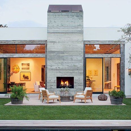 The Best of California Indoor/Outdoor Living from the Pages of AD : Architectural Digest Design Camino, Indoor Outdoor Fireplaces, Outdoor Space Design, Concrete Fireplace, Hus Inspiration, Los Angeles Homes, Celebrity Houses, Fireplace Design, Indoor Outdoor Living