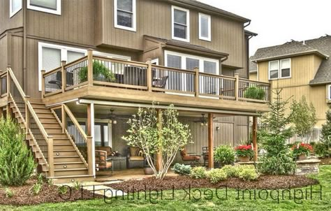 High Level Deck Designs, Bedroom Deck Ideas Master, Patio With Balcony Above, Deck Off Back Of House Staircase, Split Level Back Deck, 2nd Level Deck Ideas, 2 Story Deck Designs Walkout Basement, Walk Out Basement Deck Ideas, Under Patio Ideas