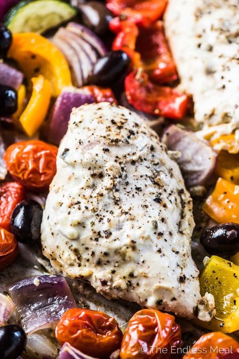 SAVE FOR LATER! Sheet Pan Tzatziki Chicken is coming to your dinnertime rescue! Chicken breasts are marinated in tzatziki then cooked on a sheet pan with lots of colorful Greek vegetables. It's a healthy and easy to make sheet pan chicken recipe that everyone will love! #theendlessmeal #chicken #chickenrecipes #healthychickenrecipes #sheetpanchicken #greekchicken #greekrecipes #tzatziki #summerfresh #healthyrecipes #glutenfree #lowcarb Sheet Pan Chicken Recipe, Greek Vegetables, Tzatziki Chicken, Greek Chicken Marinade, Sheet Pan Meals Chicken, Pan Chicken Recipes, Chocolate Honey, Tzatziki Recipes, Sheet Pan Dinners Chicken