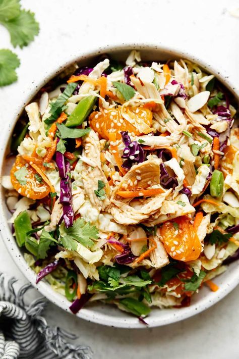 This Chinese-inspired Chicken Salad is refreshing, healthy, and filling in all the right ways. Packed with crisp-crunchy veggies, toasted nuts, tender chicken, sweet oranges, and a delicious sesame-ginger sauce, you're sure to love this gluten-free and Whole30 Chinese chicken salad recipe. Ella Vegan, Mandarin Chicken, Chinese Chicken Salad Recipe, Crunchy Veggies, Chinese Chicken Salad, Sesame Ginger, Mandarin Oranges, Layered Salad, Chicken Salad Recipe