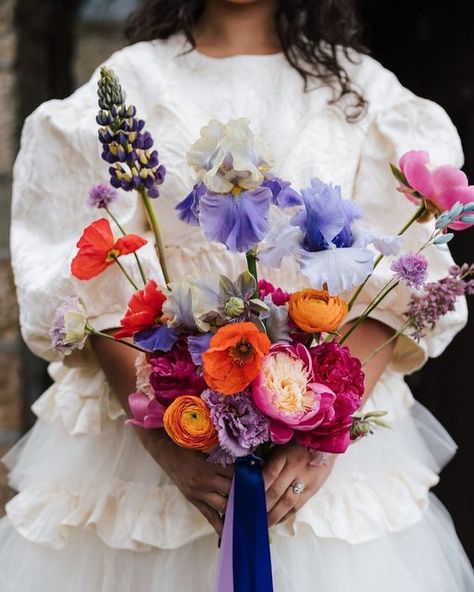 The Florist Quarter on Instagram: "Queen of making us swoon @lottiephillips.florist 🤩 This bouquet literally has it all - peonies, poppies, lupins, 'nuncs and those perfect beaded iris. It's too much!! Not to mention that dress 😍 📷 @ninahamiltonphotography @lottiephillips.florist @laila_keliani @blossflowerfarm #thefloristquarter #lottiephillips #lottiephillipsflorist #tasmanianflorist #hobartflorist #hobartweddingflowers #tasmanianflowers #tassieweddings #tasmanaianweddings #australianfl Lupins Bouquet, Iris Wedding Bouquet, Iris Wedding, Instagram Queen, That Dress, Bright Pastels, Flower Arrangement, Wedding Bouquet, Too Much