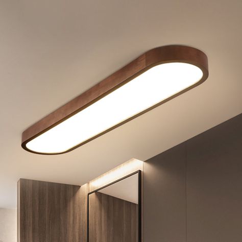 This Oblong Surface Mounted LED Ceiling Light is the perfect addition to any home. The sleek and modern design will give your space a stylish edge, and the natural Timber finish will add a warm touch to any home. The brown finish is also fade and heat resistant, meaning it will last a long time in a variety of climates. The simple flush mount design means it can either be mounted on the wall or ceiling depending on your preference.The light is made of high quality metal for durability and comes Closed Kitchen Lighting, Ceiling Lights Mounted, Surface Mounted Lights Ceilings, Surface Mount Light Fixture, Modern Surface Mount Lighting, Outdoor Ceiling Lamp, Ceiling Lights Low Ceiling, Surface Mounted Ceiling Lights, Ceiling Lamp Bathroom