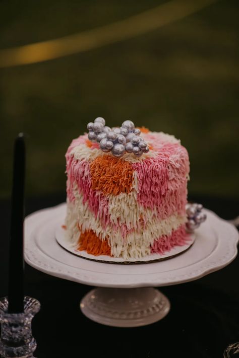 The theme for this wedding was fun, funky, and colorful. Disco Wedding Dress, Funky Wedding Cakes, Pink Pantsuit, Funky Wedding, Disco Wedding, Pink Wedding Cake, Pretty Dessert, Offbeat Bride, Modern Wedding Cake