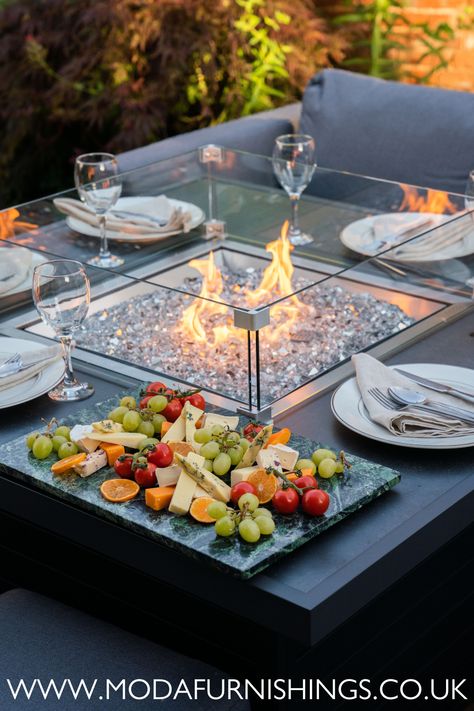 Warm up beside the fire pit table and enjoy a glass of wine with friends in your outdoor living space. Fire Coffee Table, Fire Tables Outdoor, Romantic Patio, Table Fire Pit, Fire Pit Glass, Fire Pit Tables, Fire Pit Coffee Table, Wine With Friends, Fire Pit Outdoor