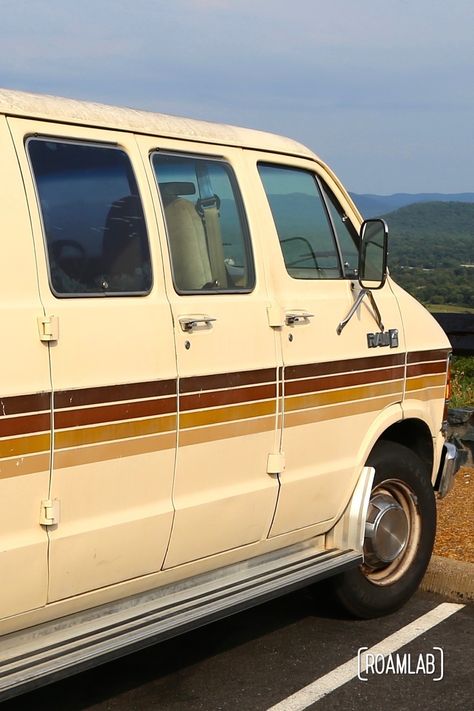 Our nomadic journy begins with Dodgy, a 1986 Dodge Ram commuter van. It is our flirtation with the much publicized #vanlife. The lessons we learn while banging around in this retro rig shapes what we want in the long run.     #roadtrip #nomads #dodge Van Outside Paint, Retro Van Stripes, Van Painting Ideas, 1970s Van, 70s Van, Van Painting, Old Van, Beige Vans, Vans Painted